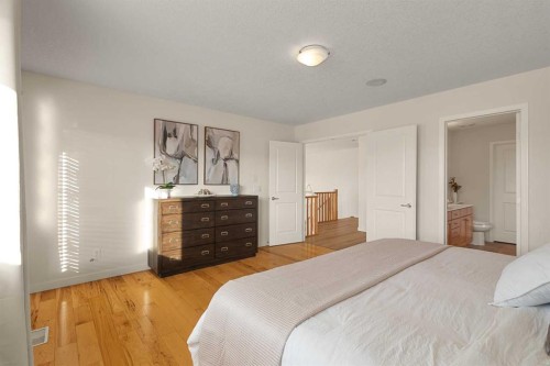 511 Cresthaven Place Sw, Calgary, AB - Indoor Photo Showing Bedroom