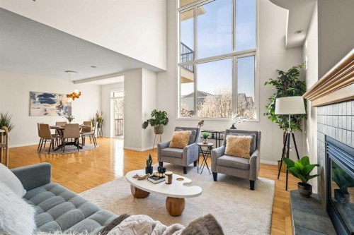 511 Cresthaven Place Sw, Calgary, AB - Indoor Photo Showing Living Room With Fireplace