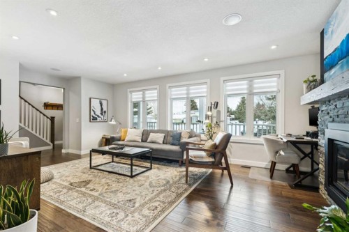 169 Braniff Crescent Sw, Calgary, AB - Indoor Photo Showing Living Room With Fireplace