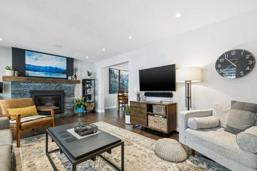 169 Braniff Crescent Sw, Calgary, AB - Indoor Photo Showing Living Room With Fireplace