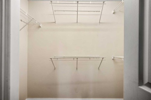 154 Bridlecreek Park Sw, Calgary, AB - Indoor With Storage