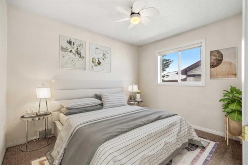 154 Bridlecreek Park Sw, Calgary, AB - Indoor Photo Showing Bedroom