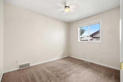 154 Bridlecreek Park Sw, Calgary, AB - Indoor Photo Showing Other Room