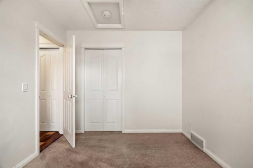 154 Bridlecreek Park Sw, Calgary, AB - Indoor Photo Showing Other Room