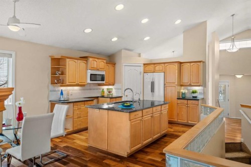 154 Bridlecreek Park Sw, Calgary, AB - Indoor Photo Showing Kitchen With Upgraded Kitchen