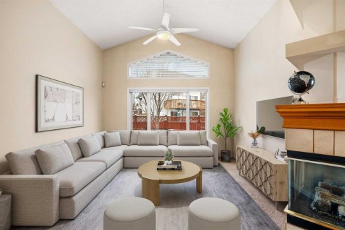 154 Bridlecreek Park Sw, Calgary, AB - Indoor Photo Showing Living Room