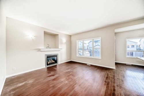 49 Covebrook Place Ne, Calgary, AB - Indoor Photo Showing Living Room With Fireplace