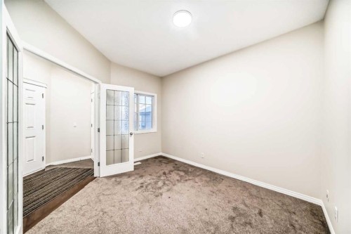 49 Covebrook Place Ne, Calgary, AB - Indoor Photo Showing Other Room