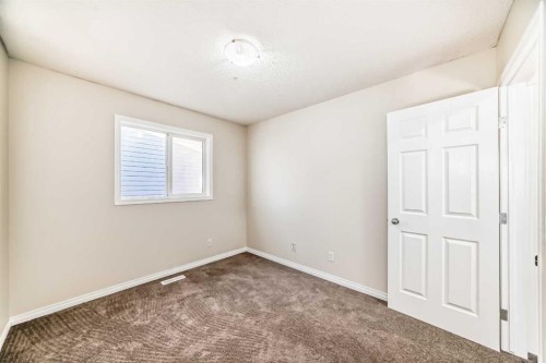 49 Covebrook Place Ne, Calgary, AB - Indoor Photo Showing Other Room