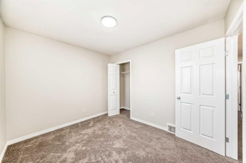 49 Covebrook Place Ne, Calgary, AB - Indoor Photo Showing Other Room