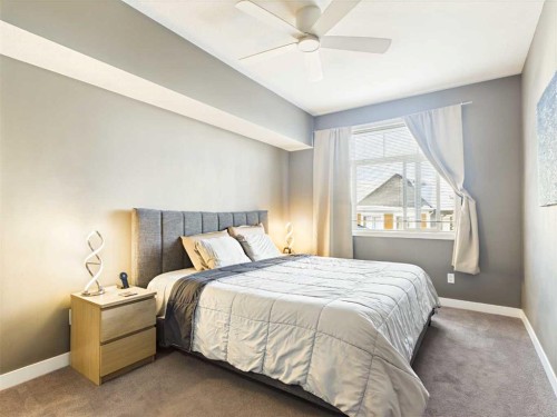 305-28 Auburn Bay Link Se, Calgary, AB - Indoor Photo Showing Bedroom