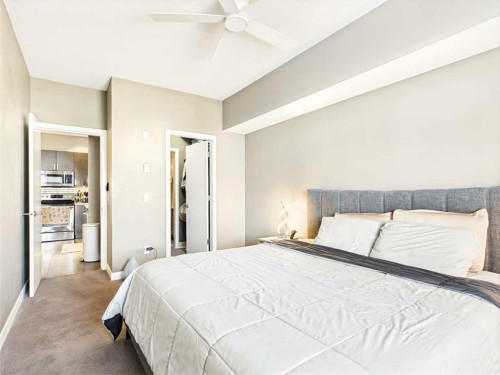 305-28 Auburn Bay Link Se, Calgary, AB - Indoor Photo Showing Bedroom