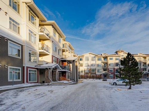 305-28 Auburn Bay Link Se, Calgary, AB - Outdoor With Balcony With Facade