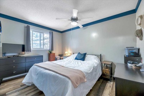 128 Thornburn Road, Strathmore, AB - Indoor Photo Showing Bedroom