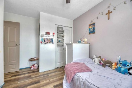 128 Thornburn Road, Strathmore, AB - Indoor Photo Showing Bedroom