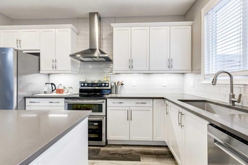 108 Evanston Hill Nw, Calgary, AB - Indoor Photo Showing Kitchen With Stainless Steel Kitchen With Upgraded Kitchen