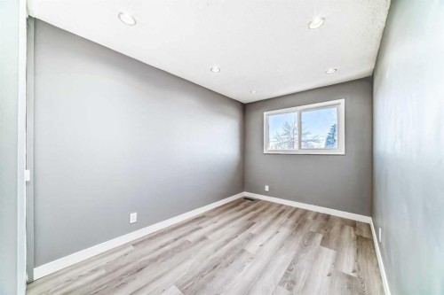 65-6100 4 Avenue Ne, Calgary, AB - Indoor Photo Showing Other Room