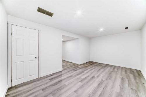 65-6100 4 Avenue Ne, Calgary, AB - Indoor Photo Showing Other Room