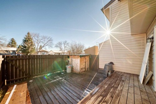 65-6100 4 Avenue Ne, Calgary, AB - Outdoor With Deck Patio Veranda With Exterior