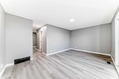 65-6100 4 Avenue Ne, Calgary, AB - Indoor Photo Showing Other Room