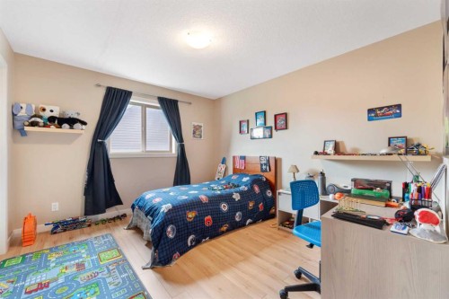 155 Autumn Close Se, Calgary, AB - Indoor Photo Showing Bedroom