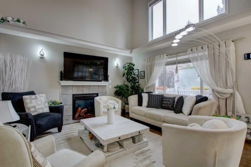 1121 Sierra Morena Court Sw, Calgary, AB - Indoor Photo Showing Living Room With Fireplace