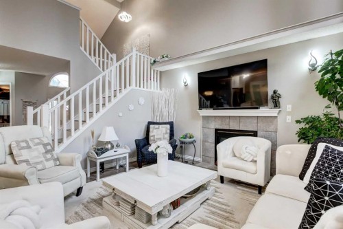 1121 Sierra Morena Court Sw, Calgary, AB - Indoor Photo Showing Living Room With Fireplace