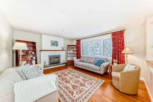 4803 Montana Drive Nw, Calgary, AB - Indoor Photo Showing Living Room With Fireplace