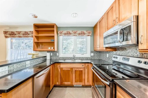 4803 Montana Drive Nw, Calgary, AB - Indoor Photo Showing Kitchen With Double Sink