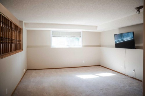 445 Rocky Ridge Bay Nw, Calgary, AB - Indoor Photo Showing Other Room