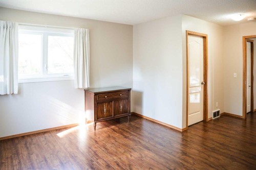 445 Rocky Ridge Bay Nw, Calgary, AB - Indoor Photo Showing Other Room