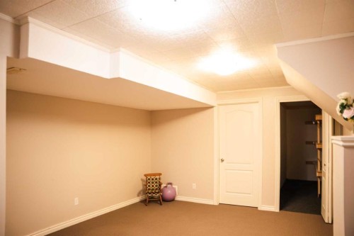 445 Rocky Ridge Bay Nw, Calgary, AB - Indoor Photo Showing Other Room