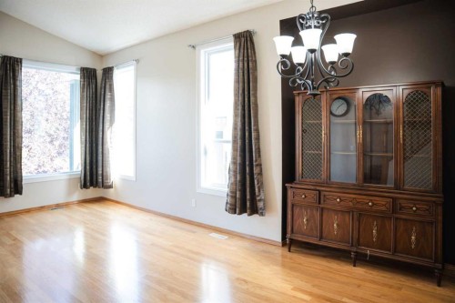 445 Rocky Ridge Bay Nw, Calgary, AB - Indoor Photo Showing Other Room