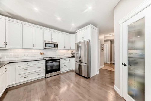 335 Morningside Crescent Sw, Airdrie, AB - Indoor Photo Showing Kitchen With Stainless Steel Kitchen