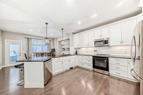 335 Morningside Crescent Sw, Airdrie, AB - Indoor Photo Showing Kitchen With Stainless Steel Kitchen With Upgraded Kitchen