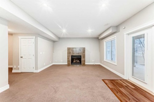 335 Morningside Crescent Sw, Airdrie, AB - Indoor With Fireplace