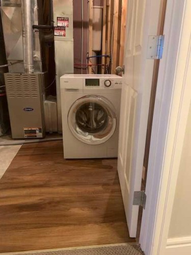 335 Morningside Crescent Sw, Airdrie, AB - Indoor Photo Showing Laundry Room