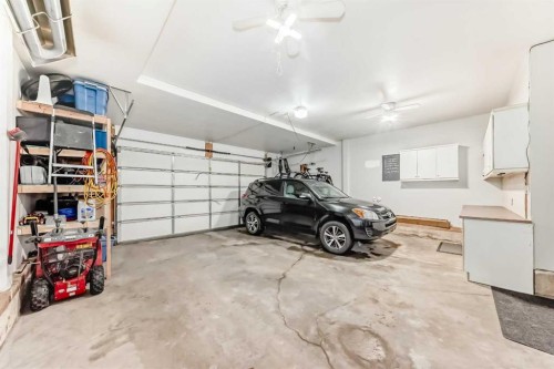 335 Morningside Crescent Sw, Airdrie, AB - Indoor Photo Showing Garage