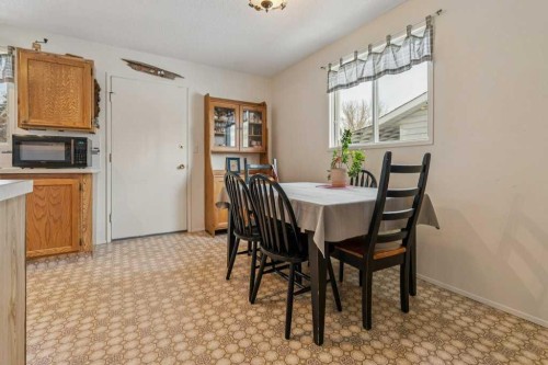 431 Maplewood Drive Se, Diamond Valley, AB - Indoor Photo Showing Dining Room