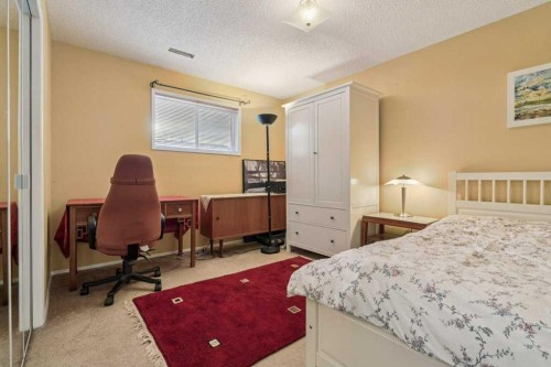 431 Maplewood Drive Se, Diamond Valley, AB - Indoor Photo Showing Bedroom
