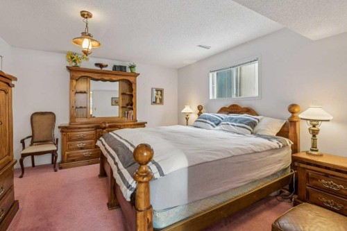 431 Maplewood Drive Se, Diamond Valley, AB - Indoor Photo Showing Bedroom