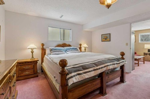 431 Maplewood Drive Se, Diamond Valley, AB - Indoor Photo Showing Bedroom