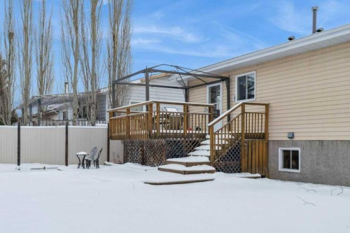 431 Maplewood Drive Se, Diamond Valley, AB - Outdoor With Deck Patio Veranda With Exterior