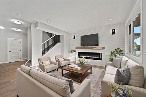 78 Vincent Crescent, Olds, AB - Indoor Photo Showing Living Room With Fireplace