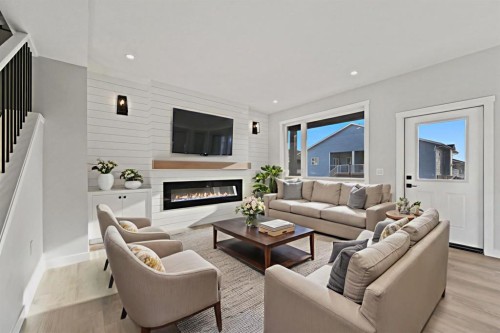 78 Vincent Crescent, Olds, AB - Indoor Photo Showing Living Room With Fireplace