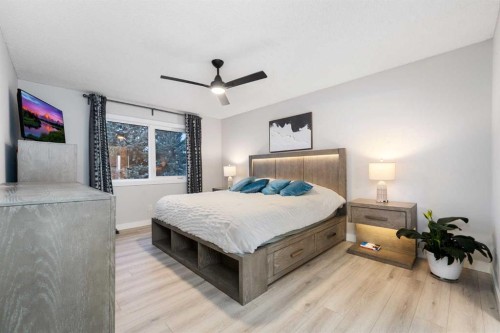 103 Sunset Place, Okotoks, AB - Indoor Photo Showing Bedroom