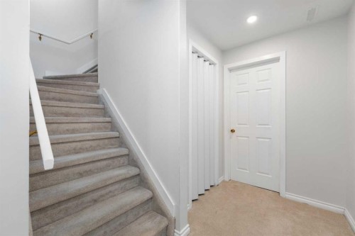 103 Sunset Place, Okotoks, AB - Indoor Photo Showing Other Room