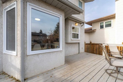 103 Sunset Place, Okotoks, AB - Outdoor With Deck Patio Veranda With Exterior