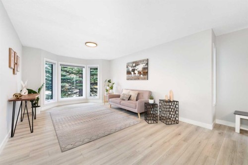 103 Sunset Place, Okotoks, AB - Indoor Photo Showing Living Room