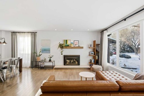 3449 Lane Crescent Sw, Calgary, AB - Indoor Photo Showing Living Room With Fireplace